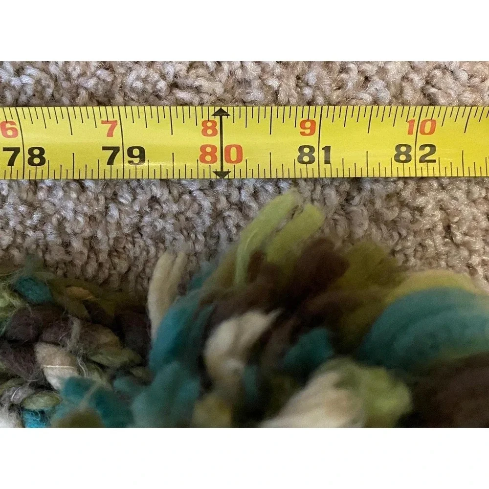 Fossil scarf pompom